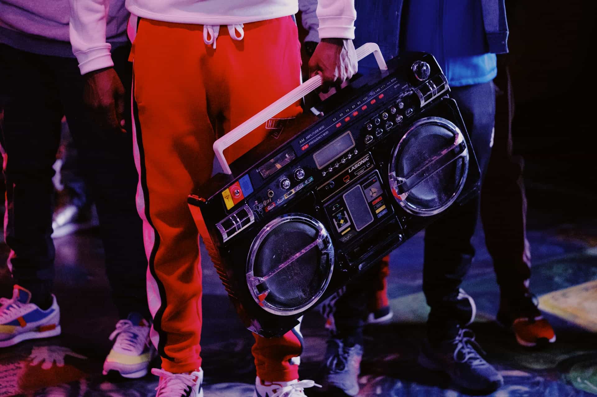 Rap Music group with a huge 90s portable stereo