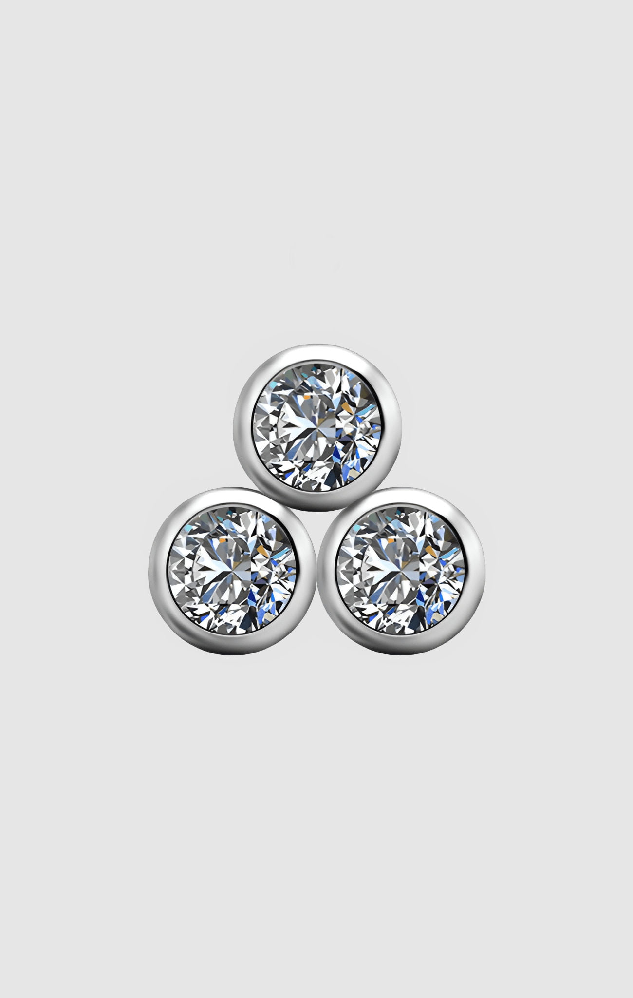Silk Triplet titanium facial jewelry with three large triangular white PVD zirconia stones, suitable for initial or upgraded piercings.