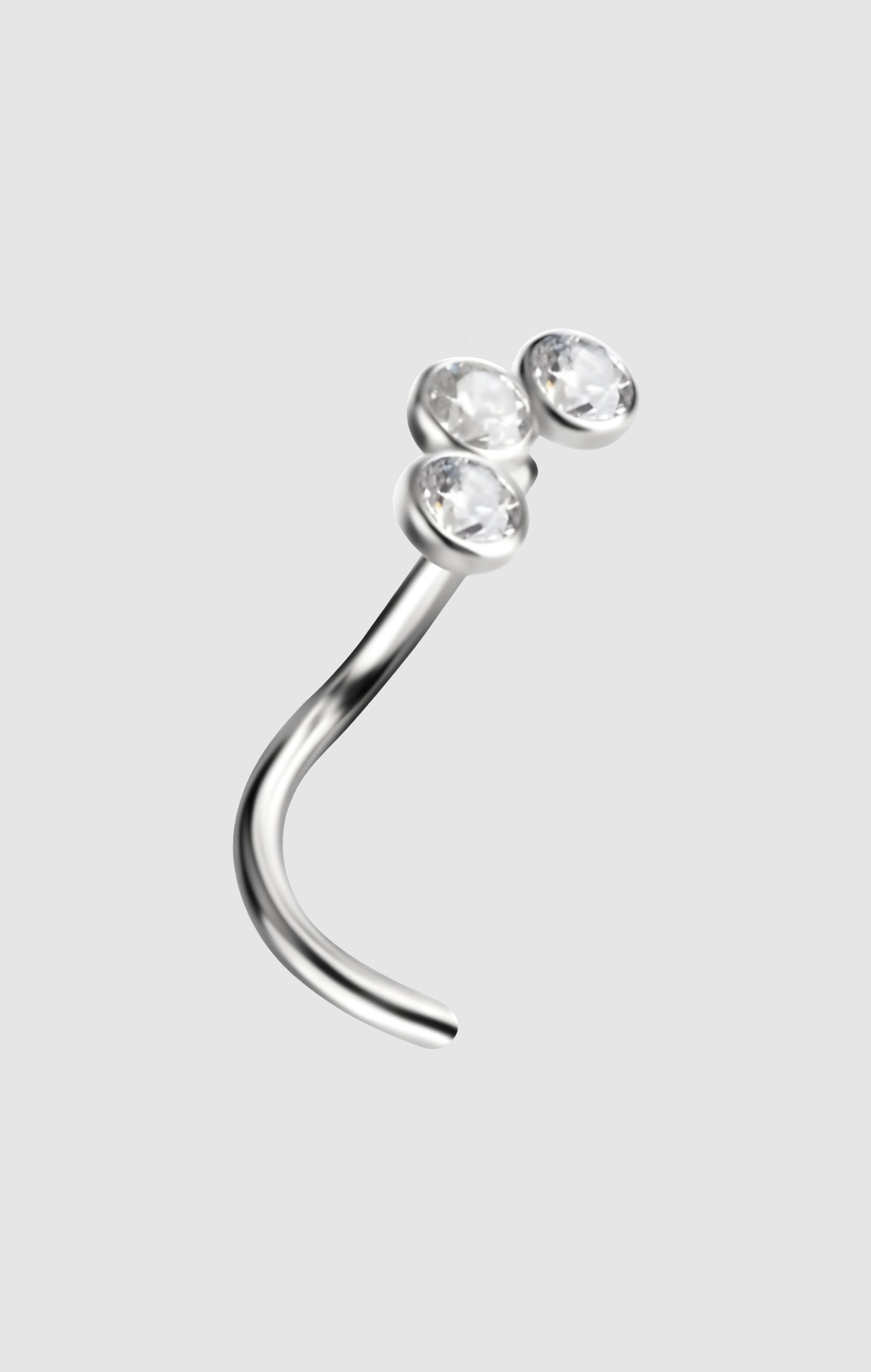 Three Gems titanium nostril stud with three sparkling white zirconia stones, suitable for initial nostril piercings.