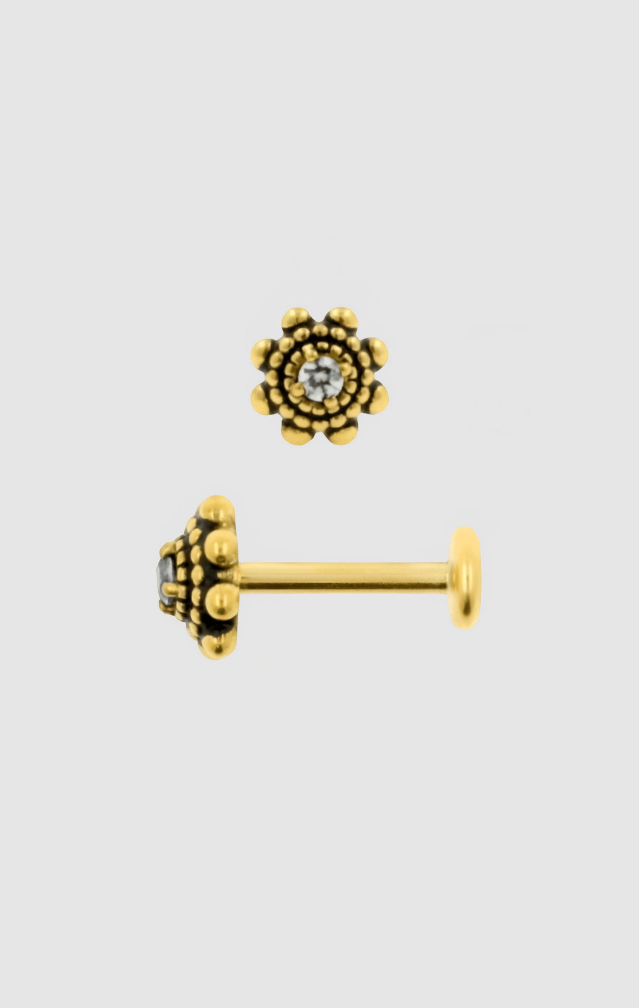 Sunlit Blossom titanium facial jewelry in gold PVD, adorned with Swarovski crystals in a sunflower design, suitable for initial or upgraded piercings.